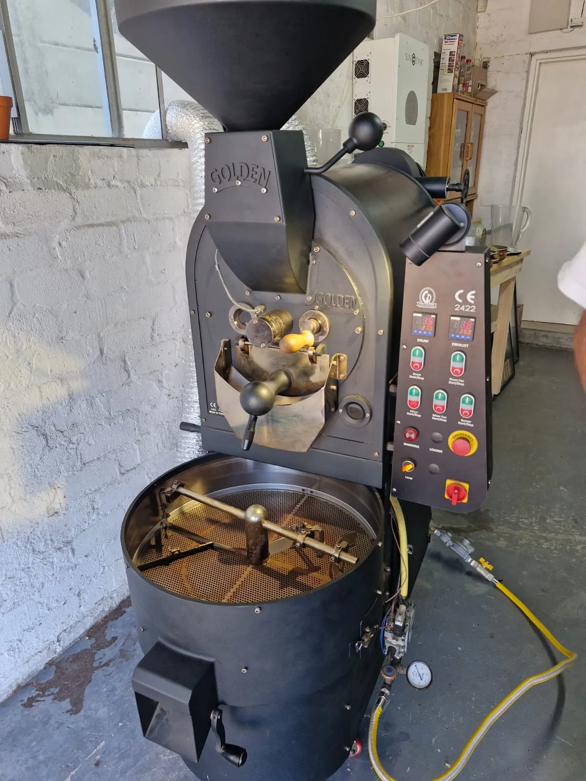 Black Golden branded 5kg drum coffee roaster with control panel showing drum, exhaust and burner switches
