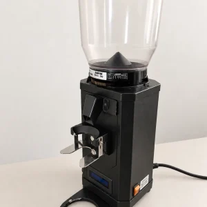 Second-hand Anfim SCODY on-demand espresso grinder in black, three-quarter view with the portafilter fork