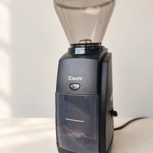 Second-hand Baratza Encore conical burr coffee grinder in black, front three-quarter view