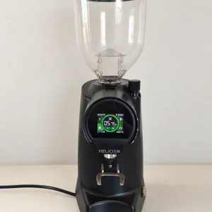 Second-hand Eureka Helios 80 commercial espresso grinder in black with its digital display lit