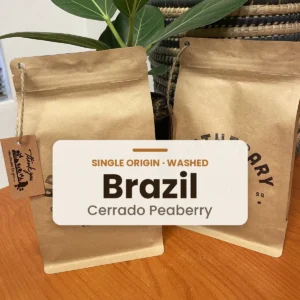 Bag of Apothecary Brazil Cerrado Peaberry (Washed) coffee beans, labelled